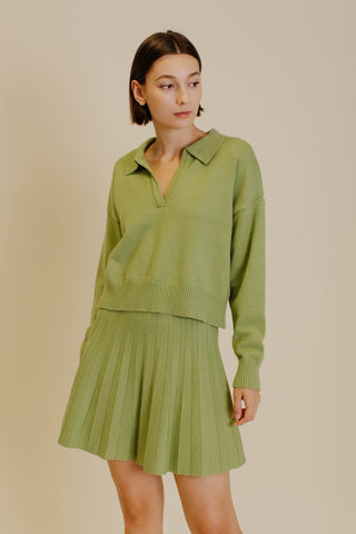 Green knit set. Matching cropped sweater and pleated knit skirt.